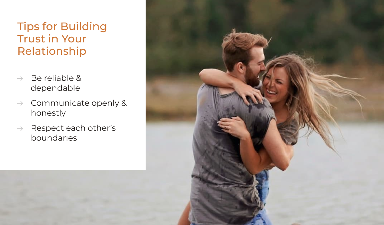Tips for building trust in your relationship - Photo of a happy couple building intimacy through adventure.