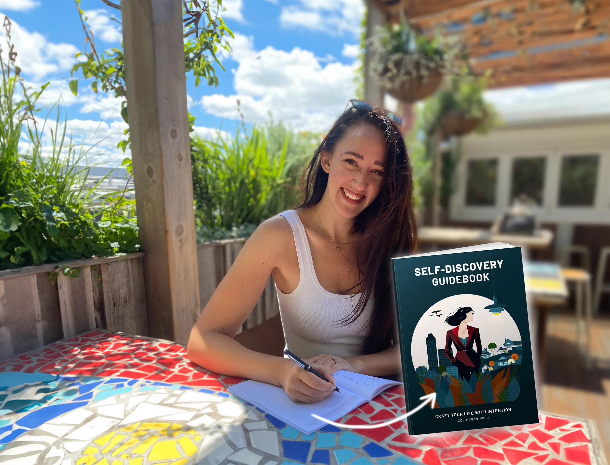 Zoe West filling out the self-discovery guidebook